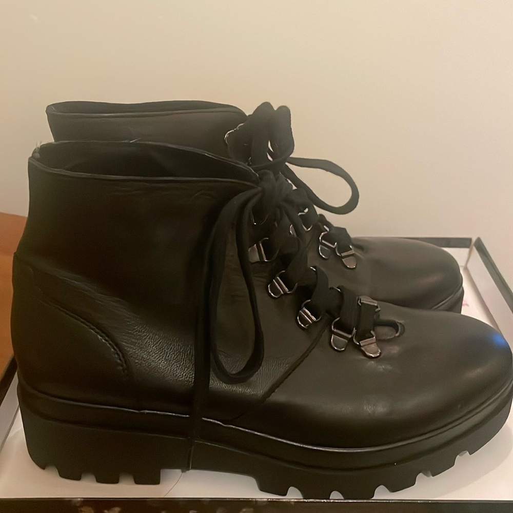 Black leather lace up booties ankle size 8. This size fits true to size.